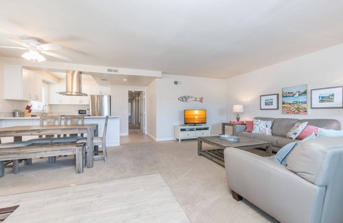 West Newport Condo | 7BR Retreat with Ocean View Balcony & Patio, Just Steps from the Sand!