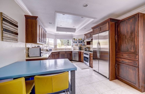 Sherwood Forest and Thistle Development House | 8 Bedroom Pool, Flowing Lazy River & Water Slide near Disneyland! PRIVATE OASIS!