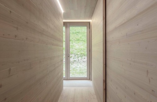 Santo Stefano di Cadore Ski Chalet | A beautiful wood and glass chalet at the edge of the Forest
