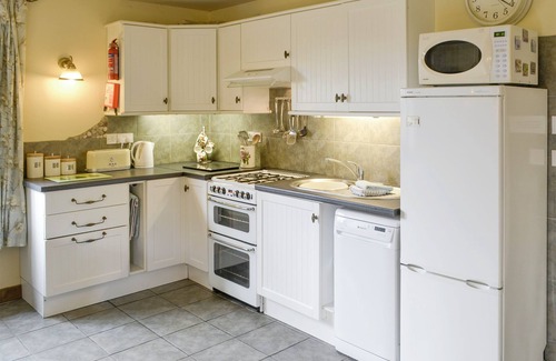 Costessey Cottage | A dog friendly cottage for four with its own swimming pool and enclosed garden.