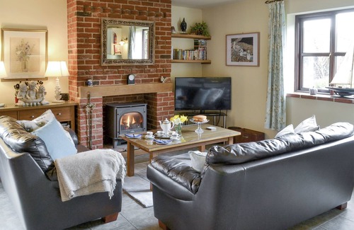 Costessey Cottage | A dog friendly cottage for four with its own swimming pool and enclosed garden.