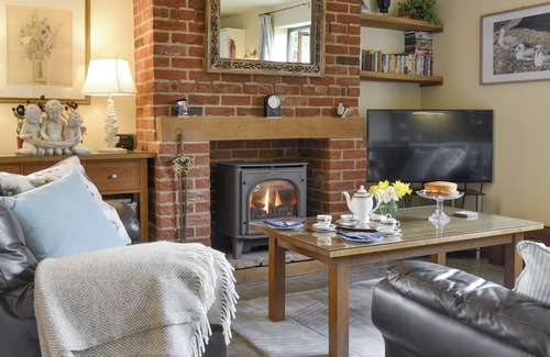 Costessey Cottage | A dog friendly cottage for four with its own swimming pool and enclosed garden.