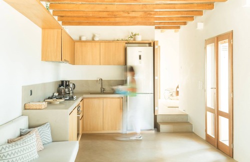 Exomvourgo House | A house in an olive grove with a unique view to the Aegean sea.