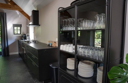 Ermelo House | A luxury group accommodation in which you can spend a nice time with your family or group of friends. This large robust house accommodates everyone, has a spacious living room, and has 8 bedrooms and 4 bathrooms.