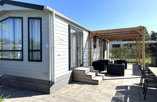 Sint Maarten House | A modern chalet on a spacious plot with a garden shed and electricity for your e-bikes.