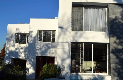 Carrasco House | A newspaper house in a residential area