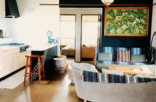 Namihira House | A panoramic ocean view beyond the sugar cane field