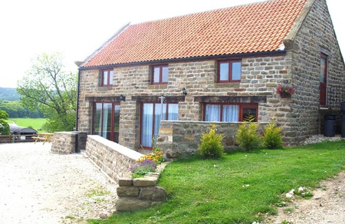 Staintondale Cottage | A recent barn conversion situated in the grounds of the owners working farm with wonderful views.