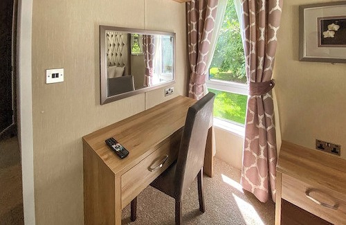 Langham House | A spacious lodge with one master double with en suite shower room.