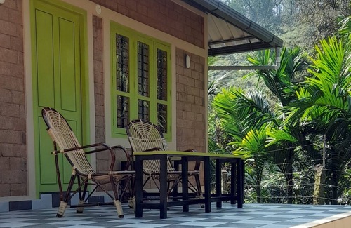 Nedumangad Cottage | A tranquil, riverside earthen home for a comfortable and peaceful stay