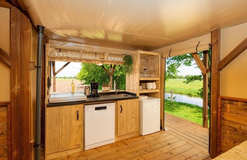 Zuna Cabin | A treehouse tent with an 'unbelievably' beautiful view over the Regge River in Twente