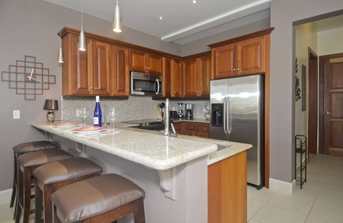 Cocoplum Condo | A Tropical Treasure - 'Gibnut' Oceanfront Condo