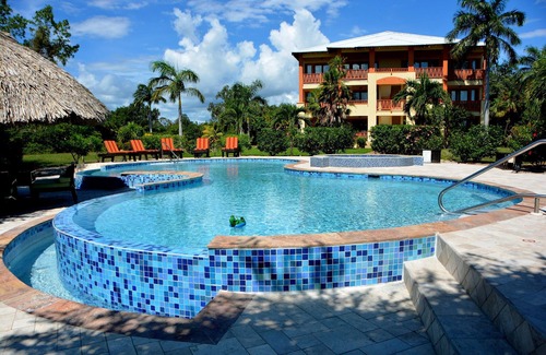 Cocoplum Condo | A Tropical Treasure - 'Gibnut' Oceanfront Condo