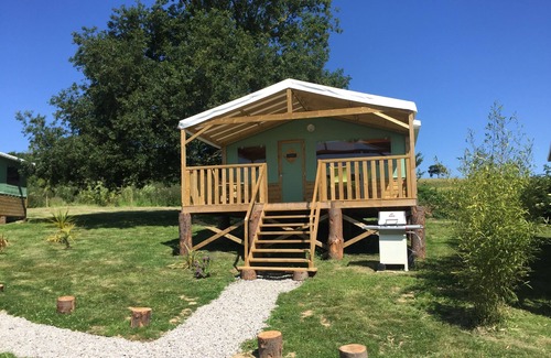 Henansal Cabin | A two bedroom luxury lodge with extra cabin beds, heated covered pool