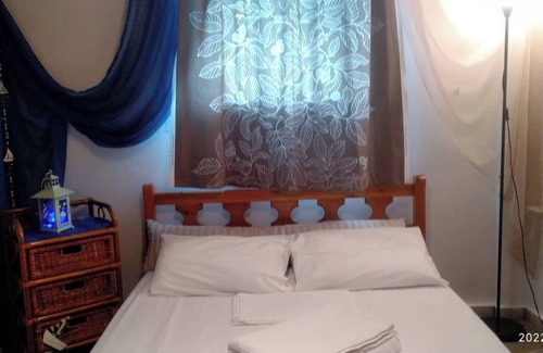 Nei Pori Cottage | Accommodation with a balcony and BBQ garden, located 200m from the beach
