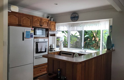 Mudjimba House | Across From Lifeguard Patrolled Beach, Bakery, Restaurant and bar Within Walking