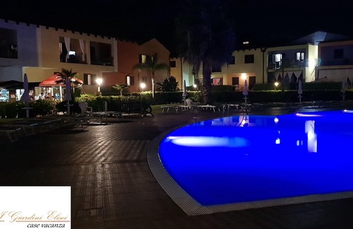 Lido Condo | AFRODITE-Elegant villa overlooking pool.