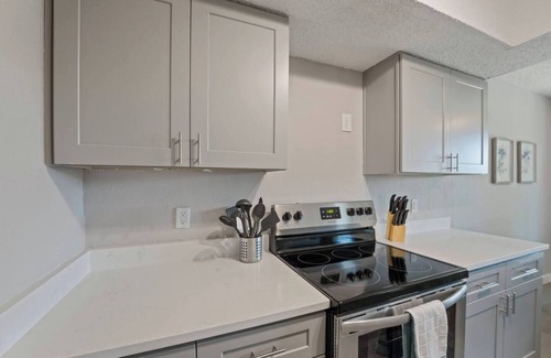 Springwoods Apartment | Airy and cheerful, newly renovated home is your sanctuary in bustling North Austin! 1,100+ SF of living area with roomy walk-in closets and large private backyard let you unpack and unwind.