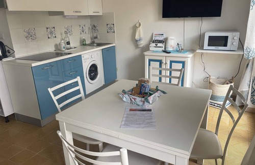 Lido Apartment | Alghero a few steps from the sea, terrace overlooking Capo Caccia