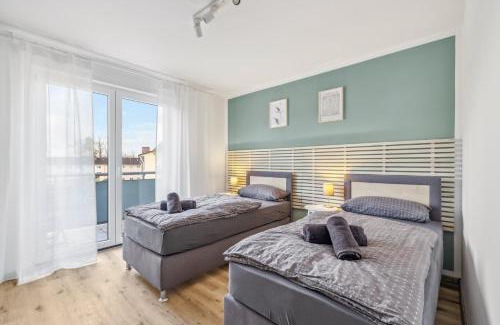 Kaiserslautern Apartment | Amalfi A02 - 2 Zi für 4P - Balkon, smart TV, Boxspringbett