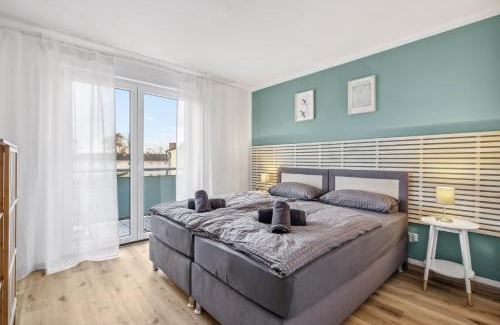 Kaiserslautern Apartment | Amalfi A02 - 2 Zi für 4P - Balkon, smart TV, Boxspringbett