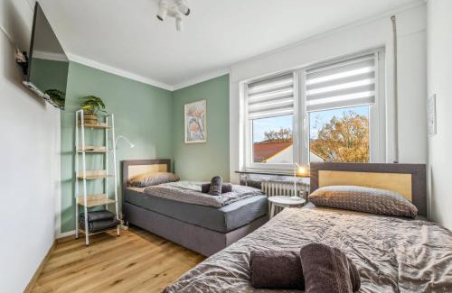 Kaiserslautern Apartment | Amalfi A02 - 2 Zi für 4P - Balkon, smart TV, Boxspringbett