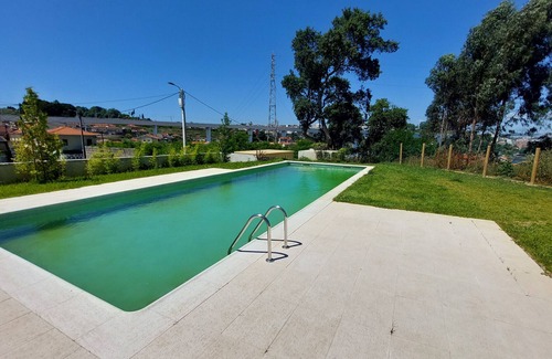 Vila Nova de Gaia Apartment | AMAZING DESIGN GARDEN with POOL by VACATIONY