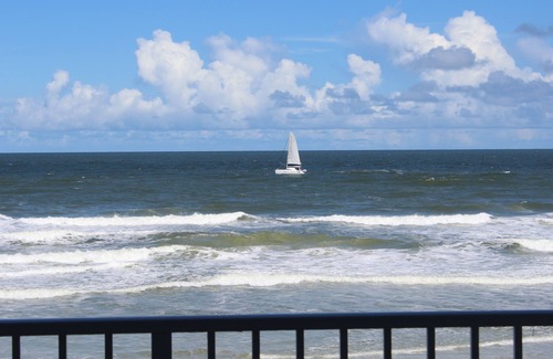 New Smyrna Beach Condo | Amazing Direct Oceanfront Views. Smyrna Beach Club. No Drive Beach steps away.