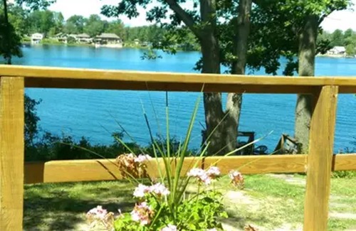 Irons House | AMAZING SUNSETS! Big Bass Lake Cottage! Swim,boat,fish!