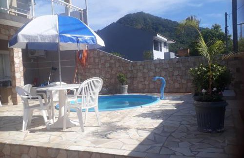 Caioba House | Ambiente acolhedor com jardim para pets