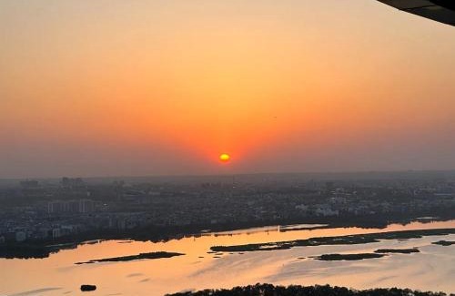 Noida Apartment | AmigosStay - High Rise Studio with river view.