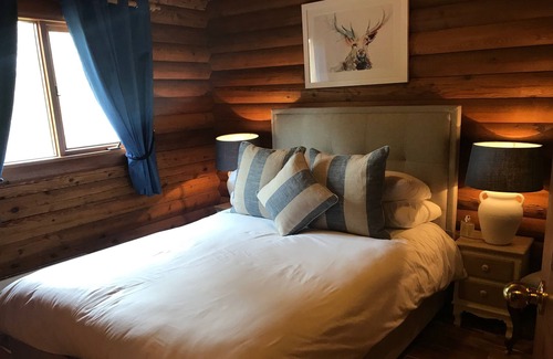 Portsonachan House | An Amazing Cedar 3 Bedroom Lodge On The Lochside at Portsonachan