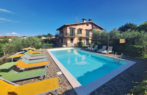 Manerba del Garda Apartment | Apartment 6 with patio, pool, soccer field and gated parking lot