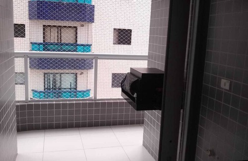 Praia Grande Apartment | Apartment facing the sea in Vila Caiçara