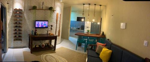 Taiba Apartment | Apartamento com vista para o mar, piscina , deck , playground e estacionamento .