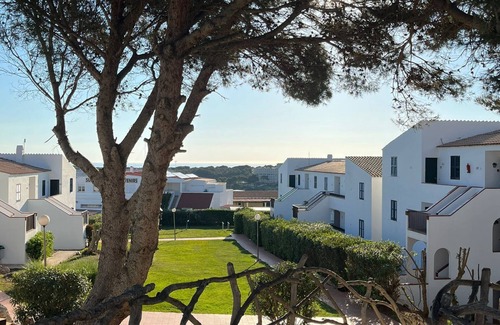 Arenal d'en Castell Apartment | Apartamento moderno, 5 min de la playa con piscina
