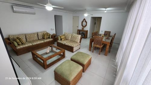Pitangueiras Apartment | Apartamento pé na areia Guarujá 3 quartos 3 banheiros sala cozinha equipada