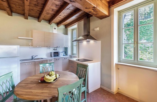San Felice del Benaco Apartment | Apartment 'Antica Torre Petrarca' with Mountain View, Wi-Fi and Air Conditioning