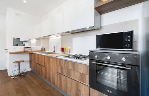 Guspini Apartment | Apartment '4 Seasons' with Balcony, Wi-Fi and Air Conditioning