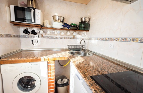 Cangas de Onis House | Apartment 'Busgosu' with Mountain Views, Private Terrace and Wi-Fi