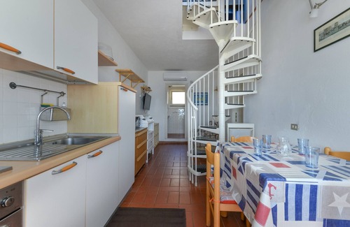 Chiessi Apartment | Apartment "Casa Ebaté" with Sea View, Terrace & Wi-Fi