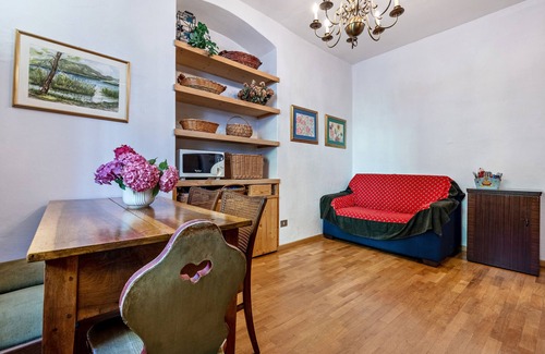 Sella Giudicarie Apartment | Apartment "Casa Nel Borgo Iris" with Mountain View and Shared Garden