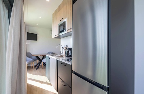 Puebla del Caraminal Apartment | Apartment 'Complejo Bungalow Con Piscina' with Sea View, Wi-Fi and Air Conditioning