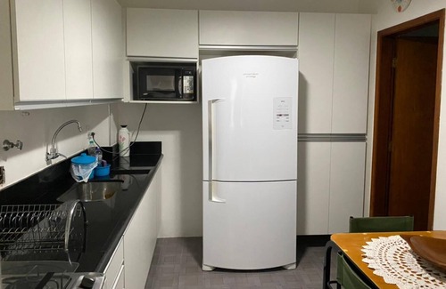 Parque Enseada Apartment | Apartment in Enseada - 2 suites + 1 bedroom with air conditioning and WIFI