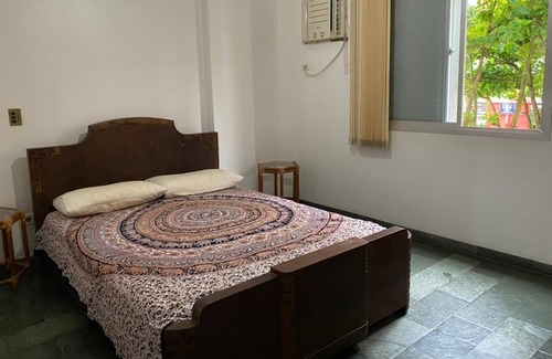 Parque Enseada Apartment | Apartment in Enseada - 2 suites + 1 bedroom with air conditioning and WIFI