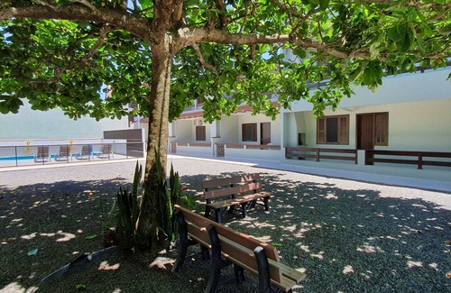 Itapoa Apartment | Apartment in gated community with pool.