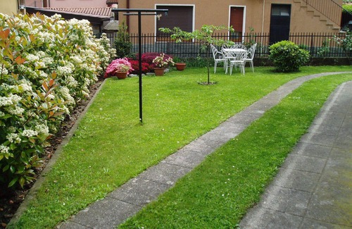 Dongo Apartment | Apartment in semi-detached house with large garden near the lake