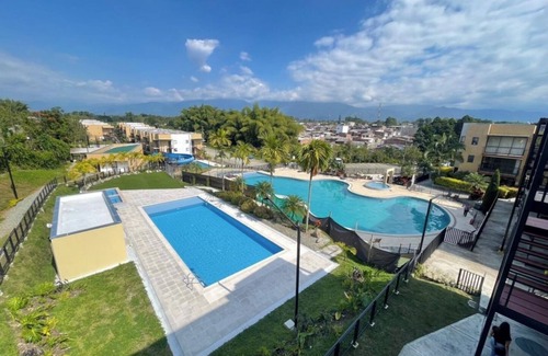 La Tebaida Apartment | Apartment in Tebaida with pool, slide, and BBQ