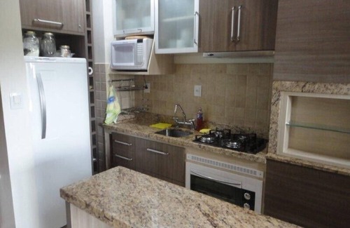 Floresta Apartment | Apartment in the center of Gramado with view, fireplace and hydro bath