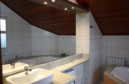 Floresta Apartment | Apartment in the center of Gramado with view, fireplace and hydro bath